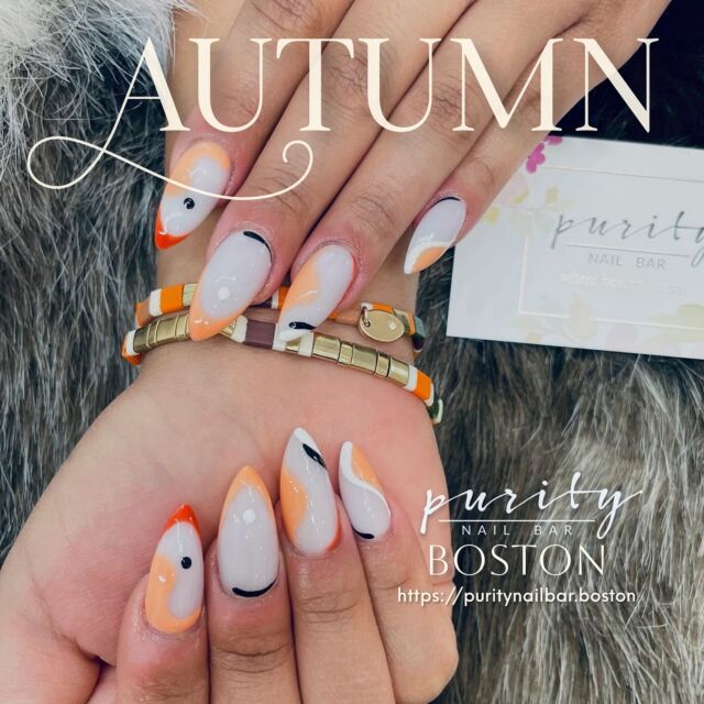 🍂 Fall in love with these sleek autumn tones! Subtle swirls with a pop of orange bring a fresh, modern twist to seasonal nails. 🍊🖤 
#PurityNailBar #NailsByJohn #BostonNailBar #BostonNailArtist #BrightonNailSalon #BrooklineNailArt #BostonManicure #NailsOfIG #NailArtObsessed #NailGoals #NailInspo #NailFashion #LongNailDesigns #NailLover #NailAddictsUnite #BrightonMA #BostonBeauty #BostonLife #FallNails #BostonUniversity #BostonCollege #shoplocalboston