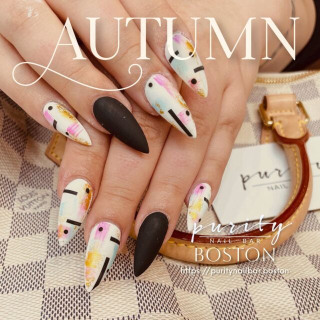 🍂 Embrace the essence of autumn with this chic nail art! 🎨 A bold mix of abstract designs and matte black accents makes for the perfect seasonal statement. Visit us at Purity Nail Bar in Boston and let your nails speak for themselves! 💅✨ #AutumnNails #BostonNailArt #PurityNailBar #AbstractNailArt #FallVibes #NailGoals #BoldNails #bostoncolledge #NailsByJohn